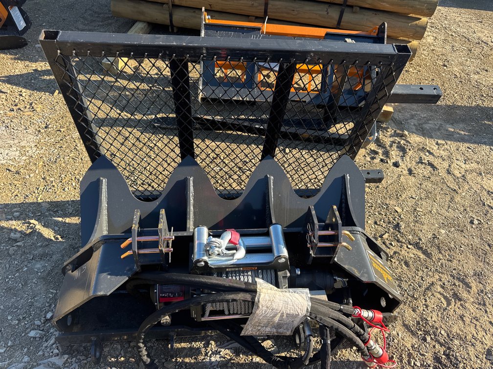 Skid steer logging attachment with hydraulic winch