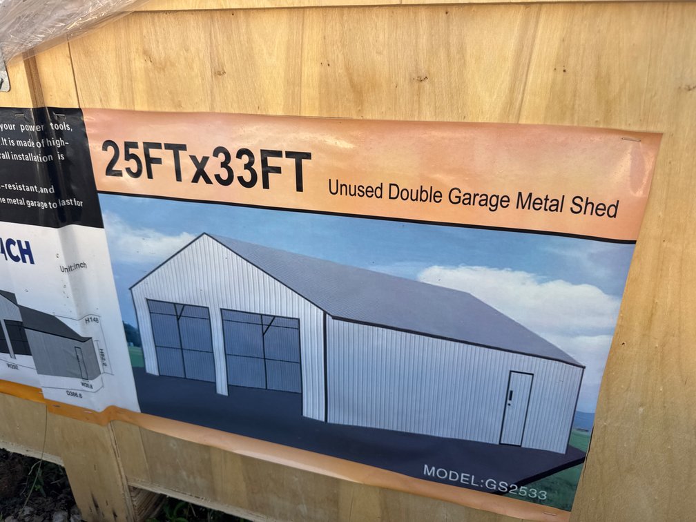 New 25x33 double garage metal shed