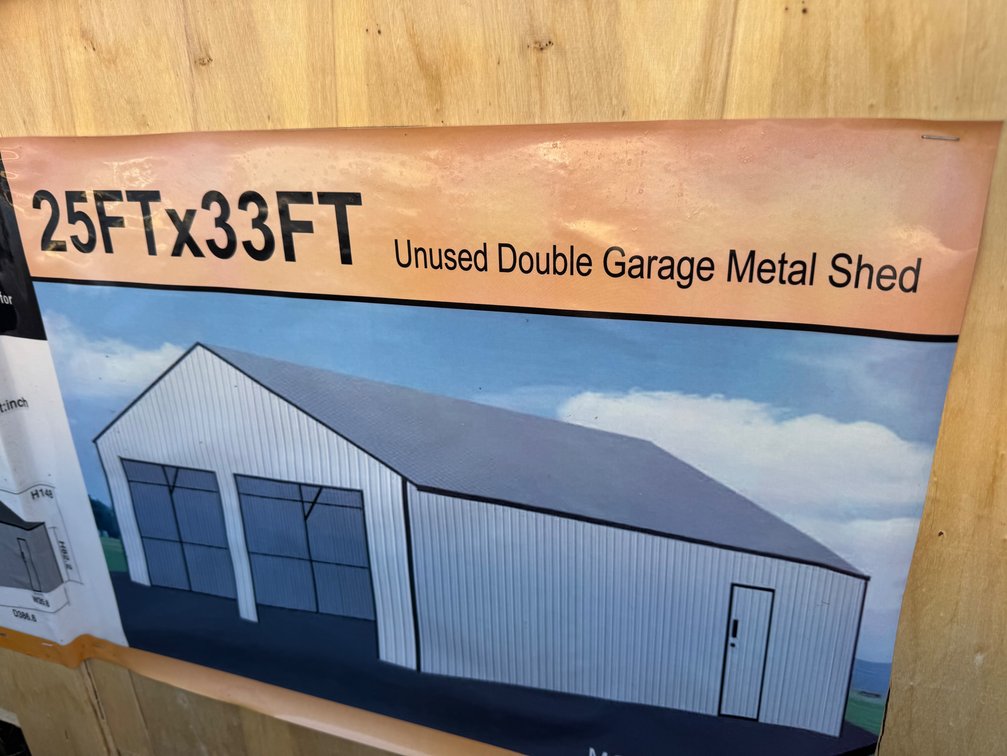 New 25x33 double garage metal shed