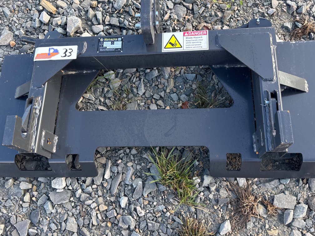 Wolverine skid steer mount quick hitch