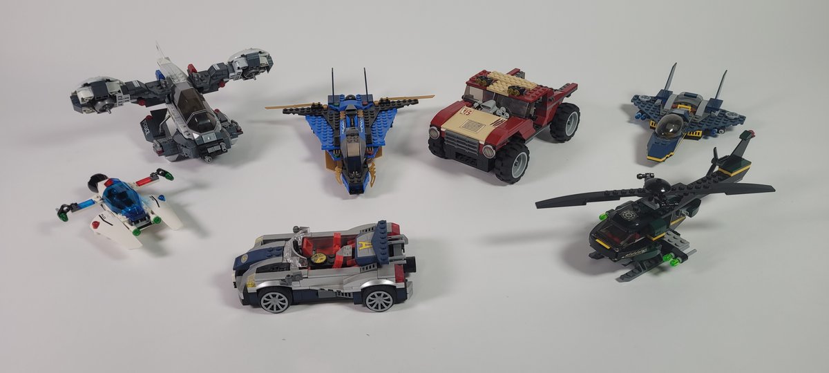Lot featuring Mega Bloks Halo Police Airview Drones, LEGO Marvel Super Heroes SHIELD Jet Interceptor, and LEGO Ninjago Jay's Storm Fighter sets