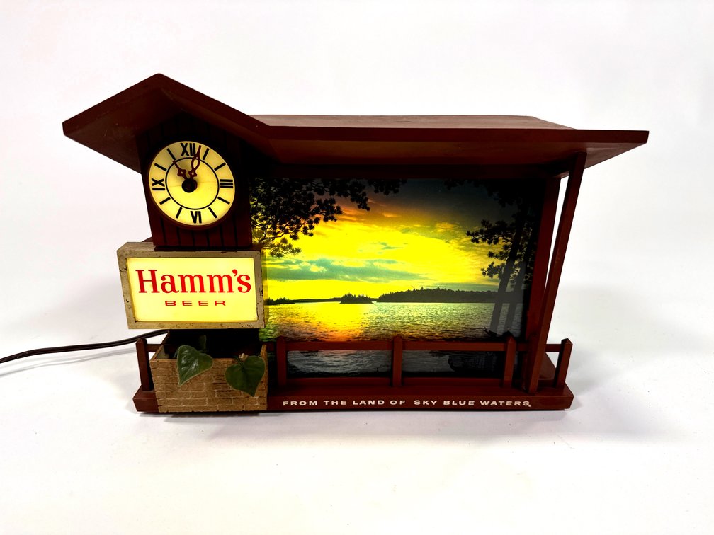 Circa 1960s Hamm’s Beer Dudk to Dawn lighted motion clock Tavern sign.