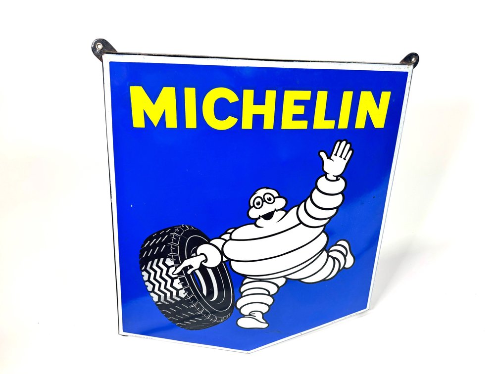 Late 1950s-early 60s Michelin Tires single sided porcelain shield shaped garage sign.