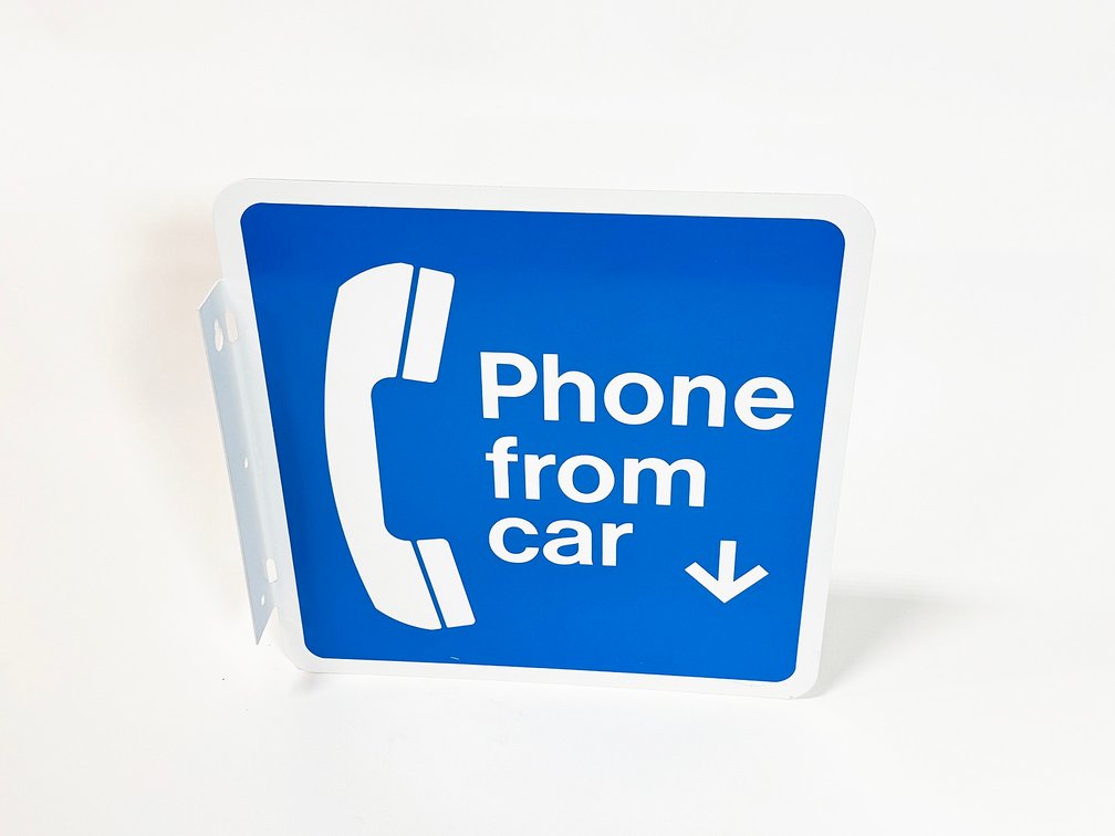 NOS 1970s Bell Telephone "Phone From Car" double-sided tin flange sign.