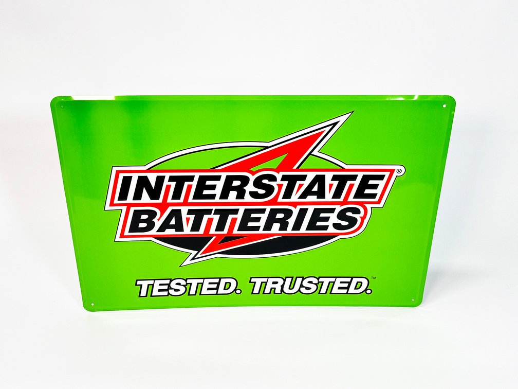 NOS Interstate Batteries single-sided tin garage sign.