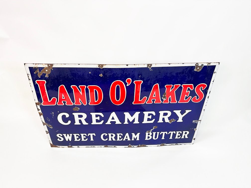 Large 1930s Land O'Lakes Creamery single-sided porcelain general store sign.