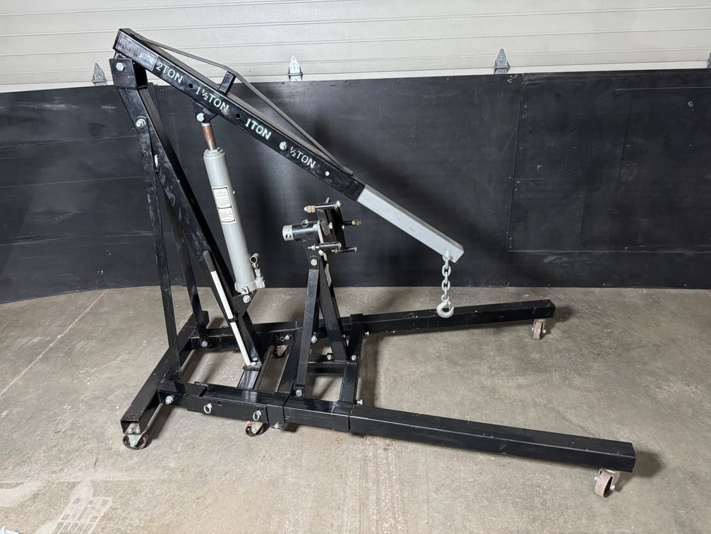Newer combination 2 ton folding hydraulic engine hoist and stand.
