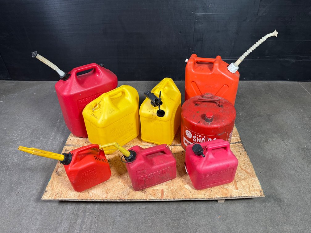 Lot of eight portable gas cans. 