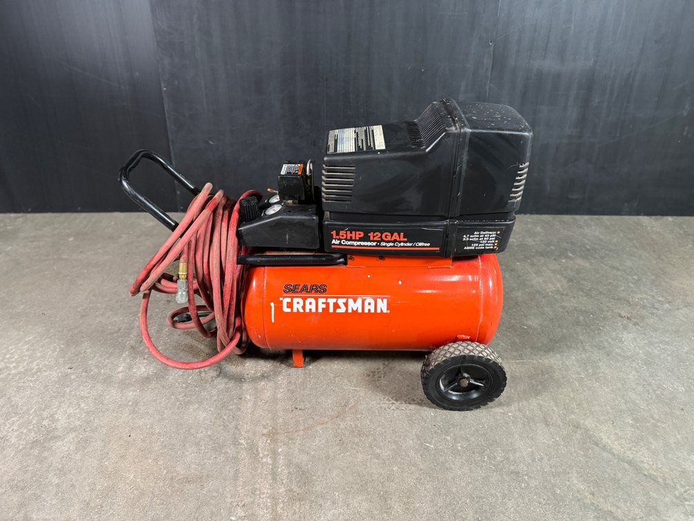 Portable air compressor with hose by Craftsman