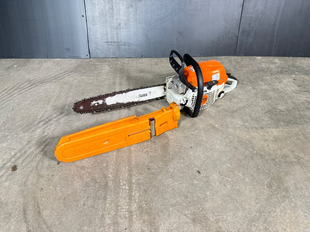 Stihl gas chainsaw with blade cover