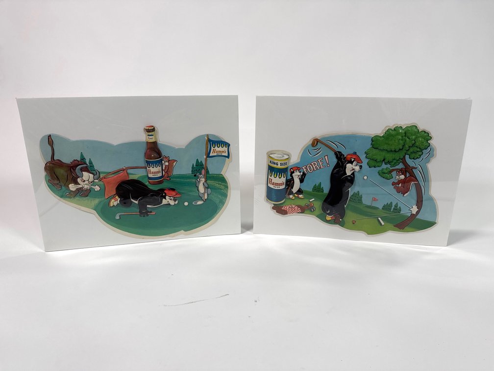 A lot of two 1960s Hamm’s Beet vacuumed formed plastic golf Matee tavern signs.