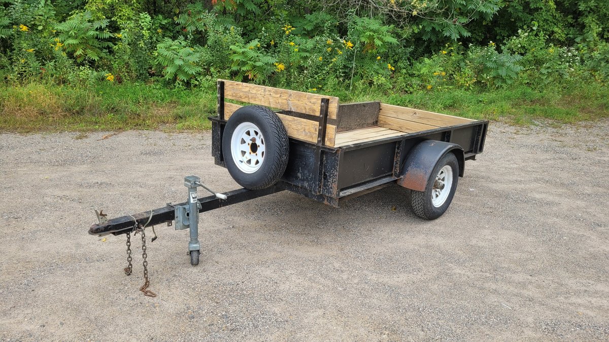 4x8 single-axle Utility Trailer with 12" metal sides.