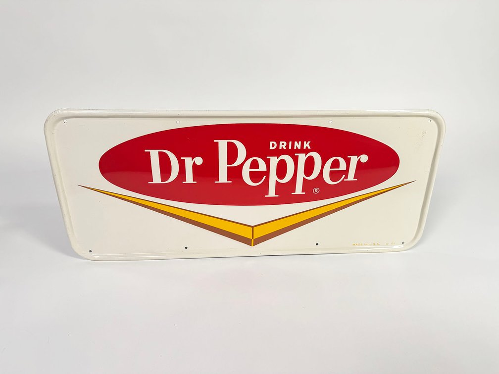 NOS late 1950s-early 60s Dr Pepper single-sided embossed tin diner sign. 