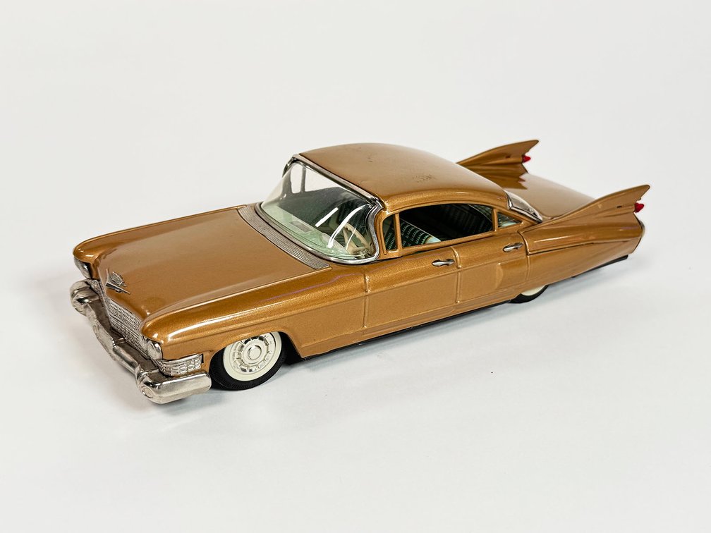 1959 Cadillac 4-dour sedan tin litho friction drive car by Bandai of Japan. 