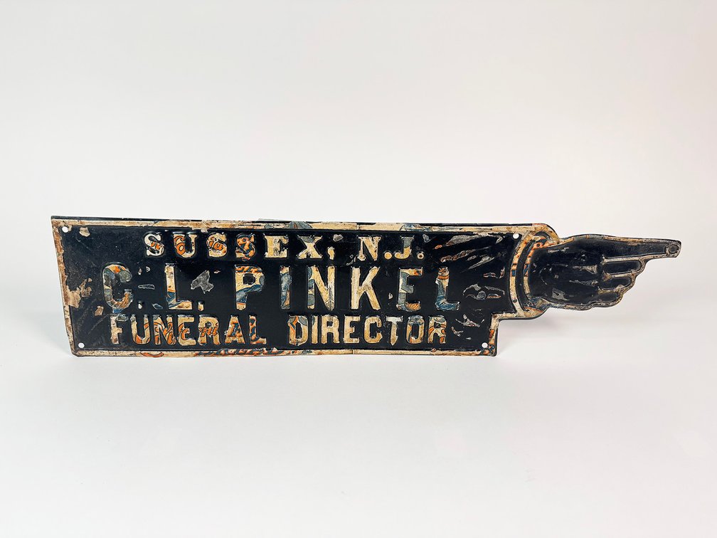 1920s Funeral Director finger-pointing directional tin sign. 