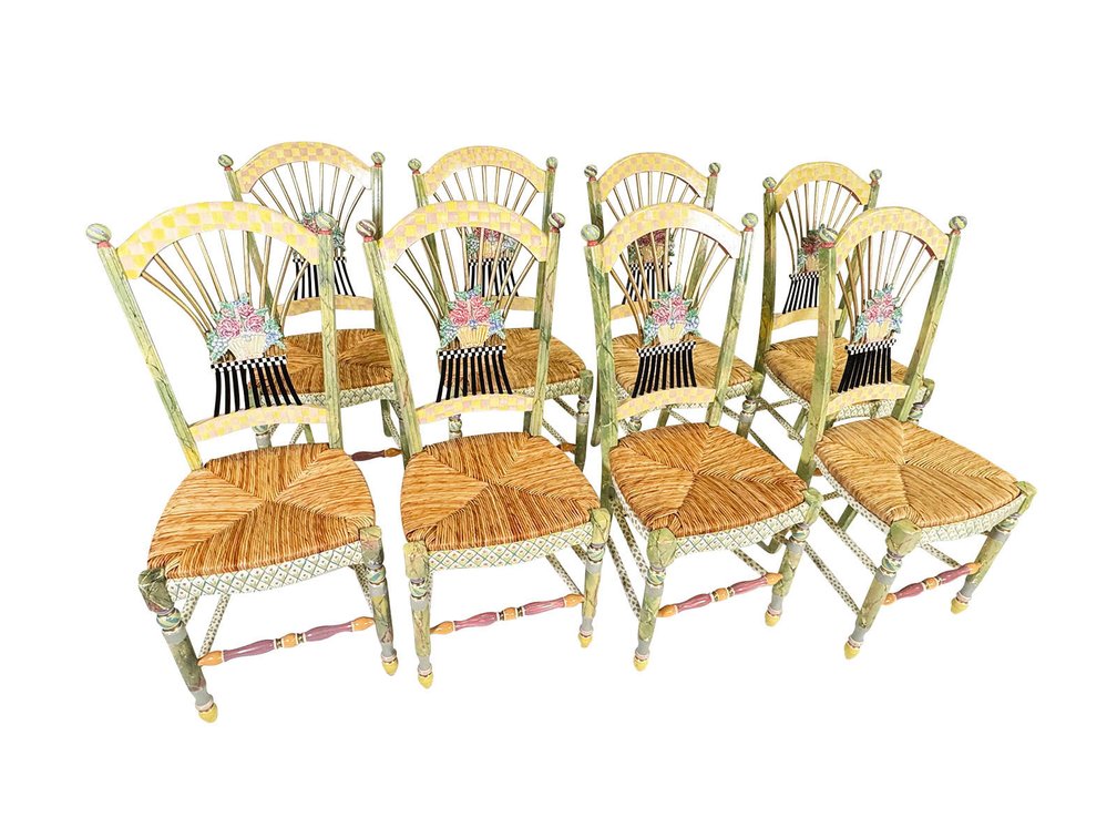 Set of eight (8) MacKenzie-Childs “Light Flower Basket” side chairs, each with hand-painted faux marble, checkerboard, and floral patterns, central majolica tile depicting bouquet of flowers, over woven rush seatmaker’s plaque under seat.