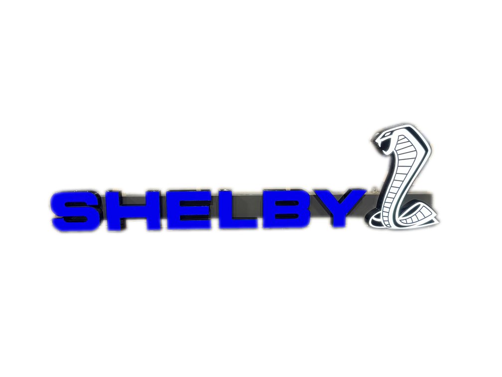 Large Shelby Cobra Automobiles single-sided light-up channel letter dealership sign.