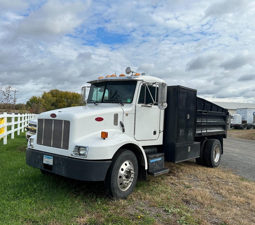 Fleet Vehicles: 2015 Transit Van, 2008 Ford F-550 XL, 2005 Peterbilt