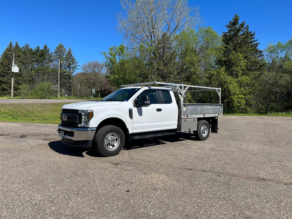 2018 Ford F-350 Pickup Truck & 2021 Dodge Ram 3500 Pickup With CM Truck Bed