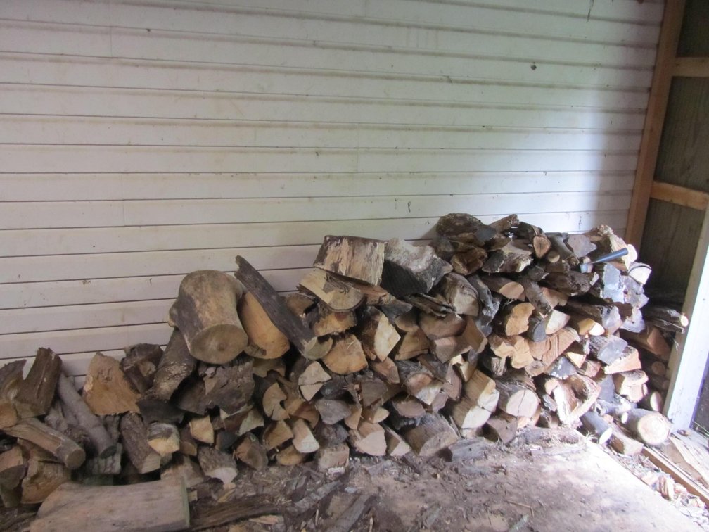 (2) Piles Of Cut And Split Firewood
