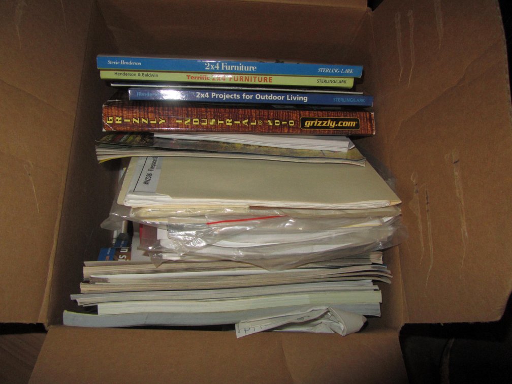 Box Full Of Assorted Wood Working Tools And Manuals