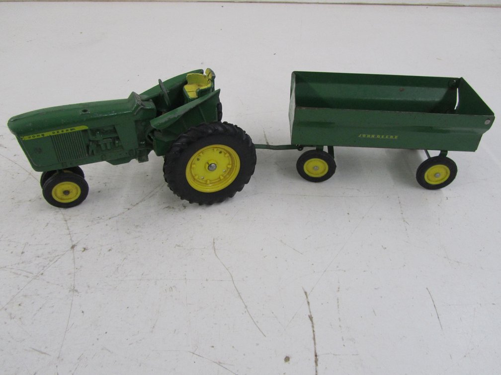 John Deer Narrow Front Tractor With Hay Wagon
