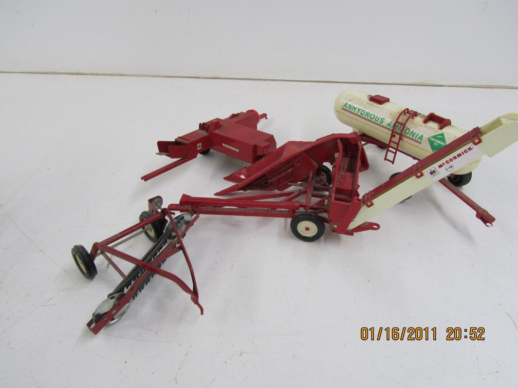 (4) Assorted Die Cast Implement Accessories