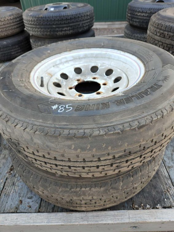 PAIR 225/75R15 TIRES ON 6 BOLT WHEEL USED