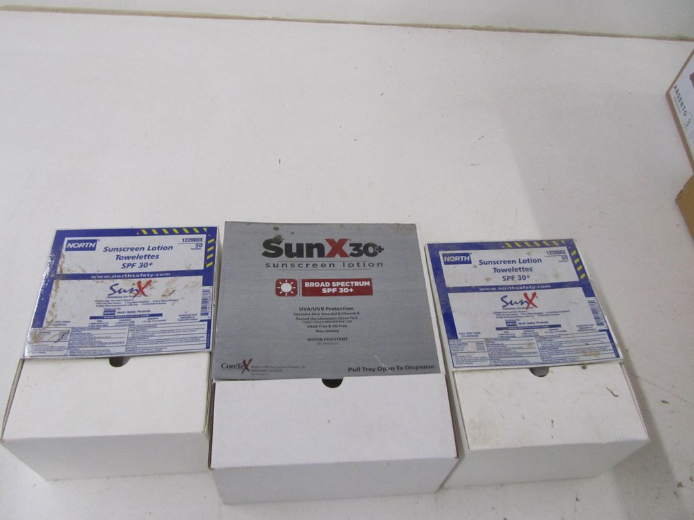 Lot Of SunX Sunscreen Lotion Packs And Sunscreen Towelettes