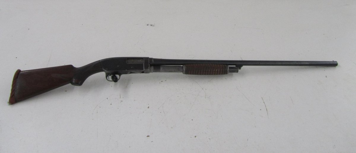 Western Field Deluxe 12 Gauge Pump Action Shot Gun