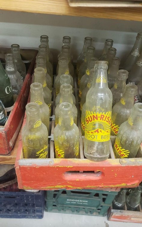 Sunrise rootbeer bottles in red case