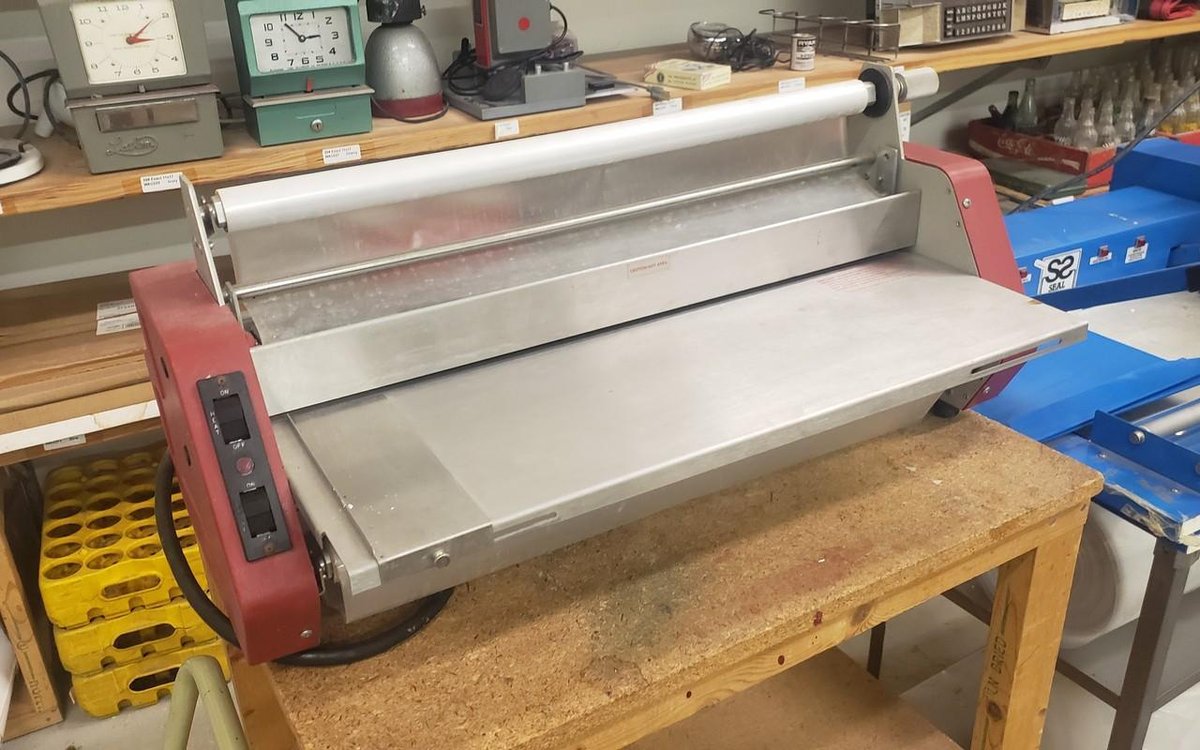 USI red Laminator and table