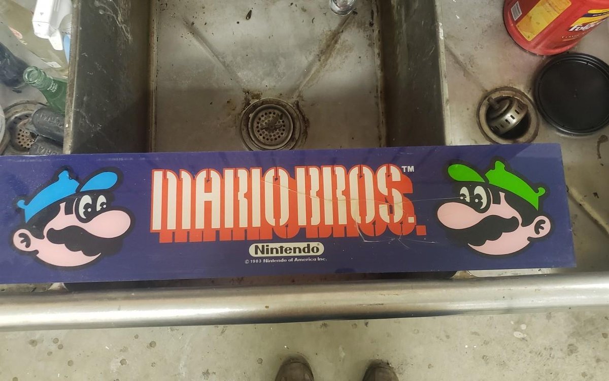 Mario Bros game placard