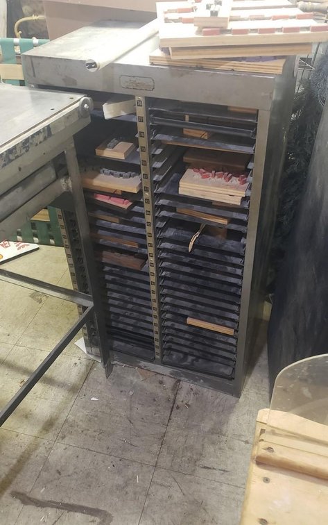 Heavy metal table with drawer