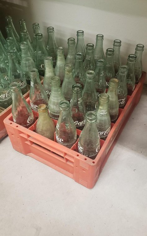 Coke bottles in case