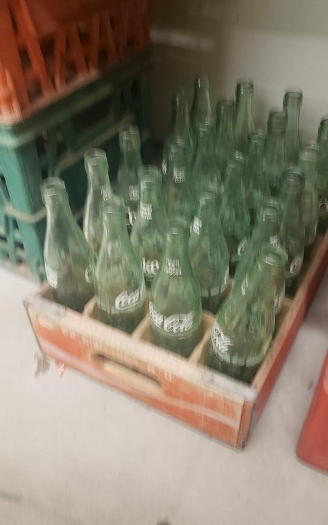 Coke bottles in case