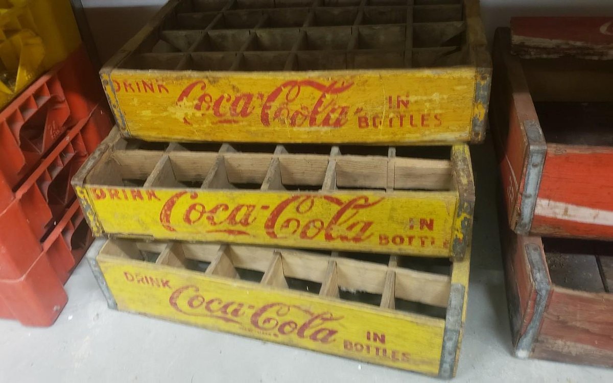 3 wooden coke crates