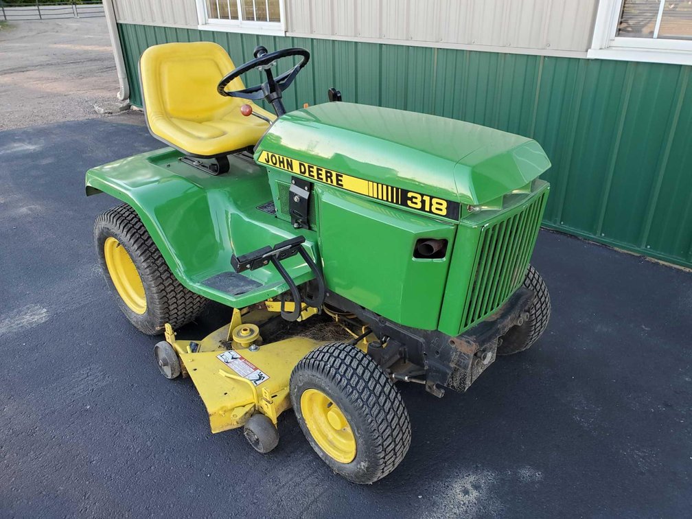 JD 318 GARDEN TRACTOR W/48" DECK, POWER STEERING,  HYDRO DRIVE, & FRONT HYDRAULICS