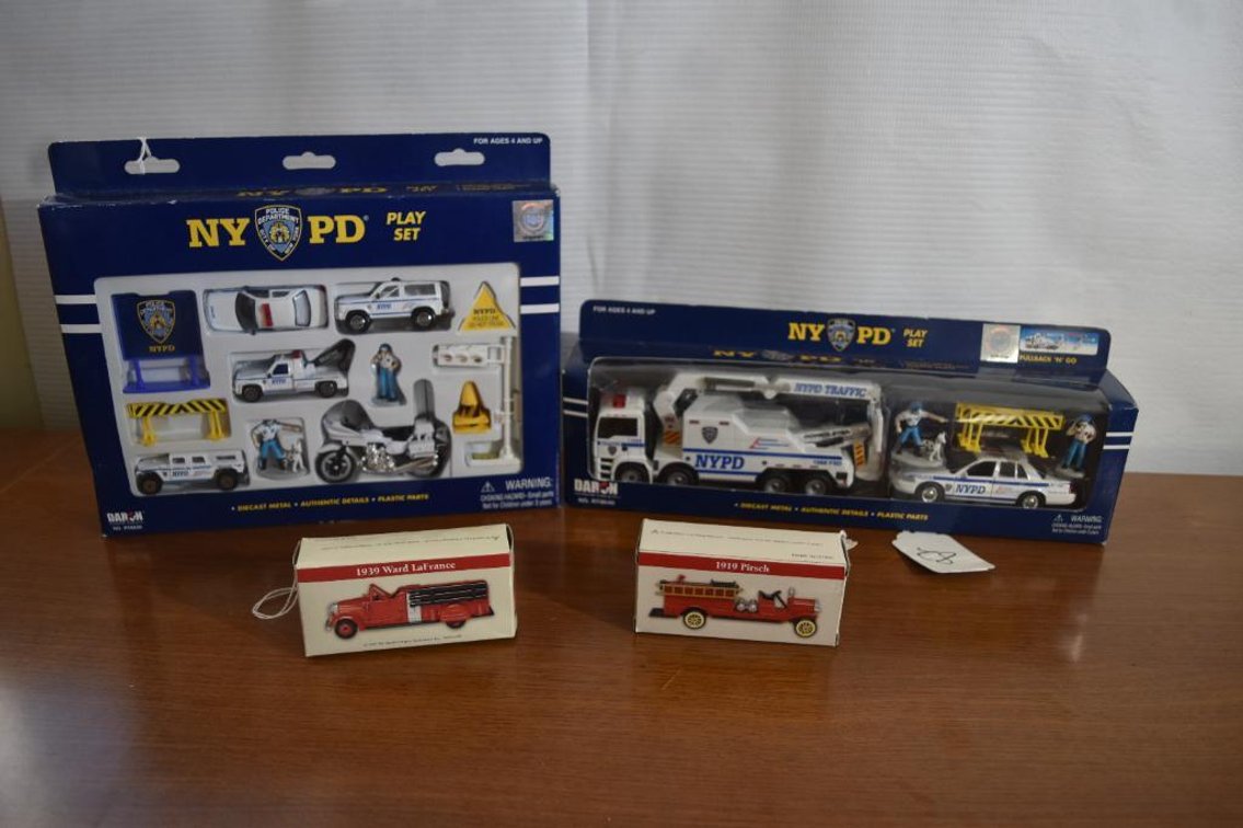Pair Of NYPD Play Sets With 19' Pirsch Fire Engine And 39' Ward LaFrance Fire Engine