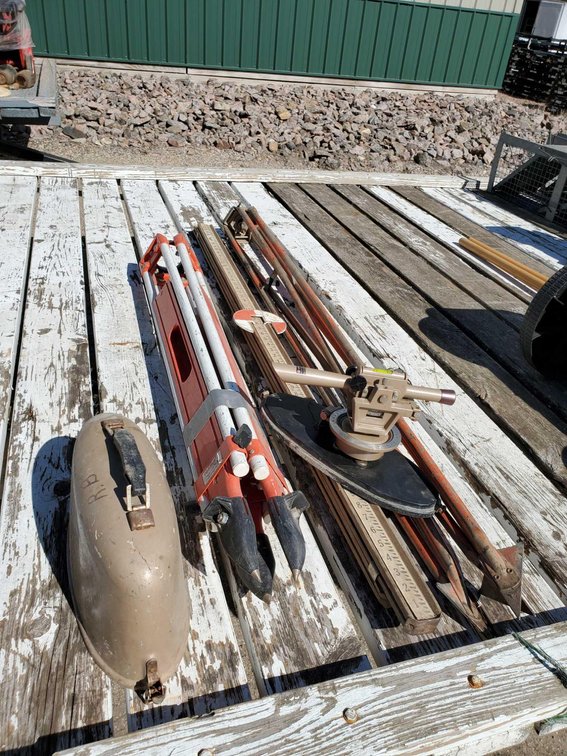 TRANSIT W/2 TRI-PODS AND MEASURING STICK