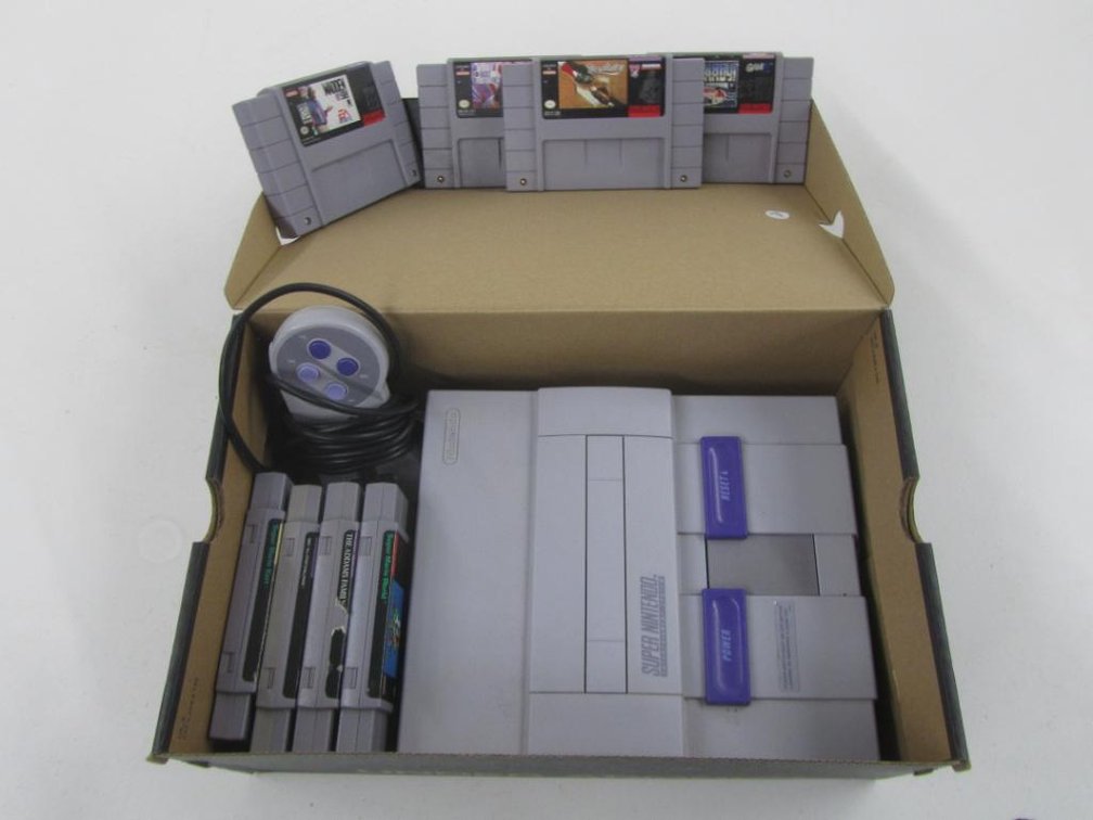 Super Nintendo With (1) Controller And (8) Games
