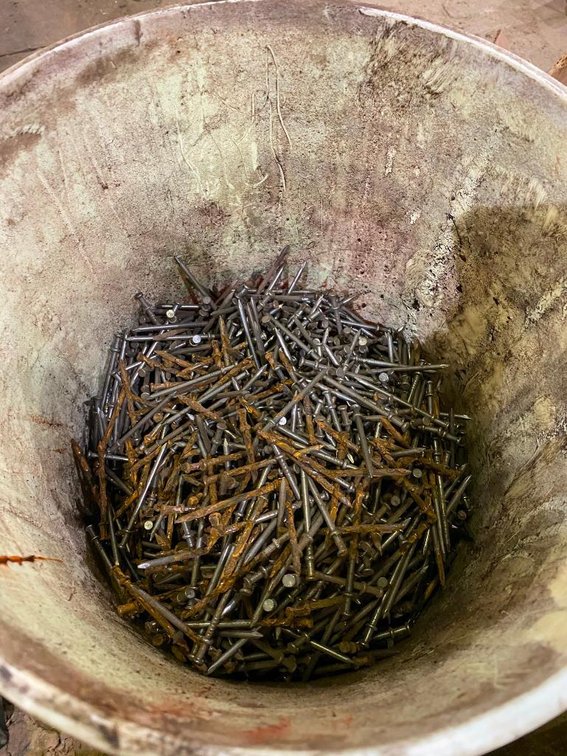 Half of a Bucket of 2 1/2" Nails