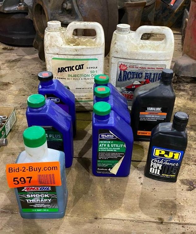 (3) Quarts of 4 Cycle Synthetic All Season Oil, Quart of Synthetic Shock Therapy, Fork Tuner, Fork Oil, 2 Stroke Lubricant And Artic Cat Injection Oil