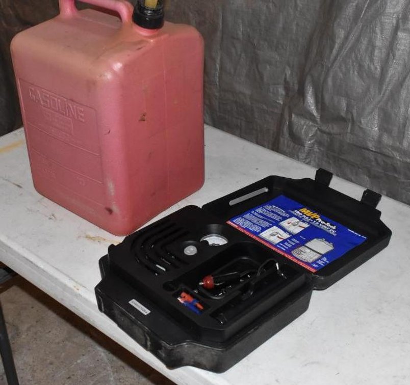 5 GALLON GAS CAN AND 12 V DC PORTABLE AIR COMPRESSOR IN CASE