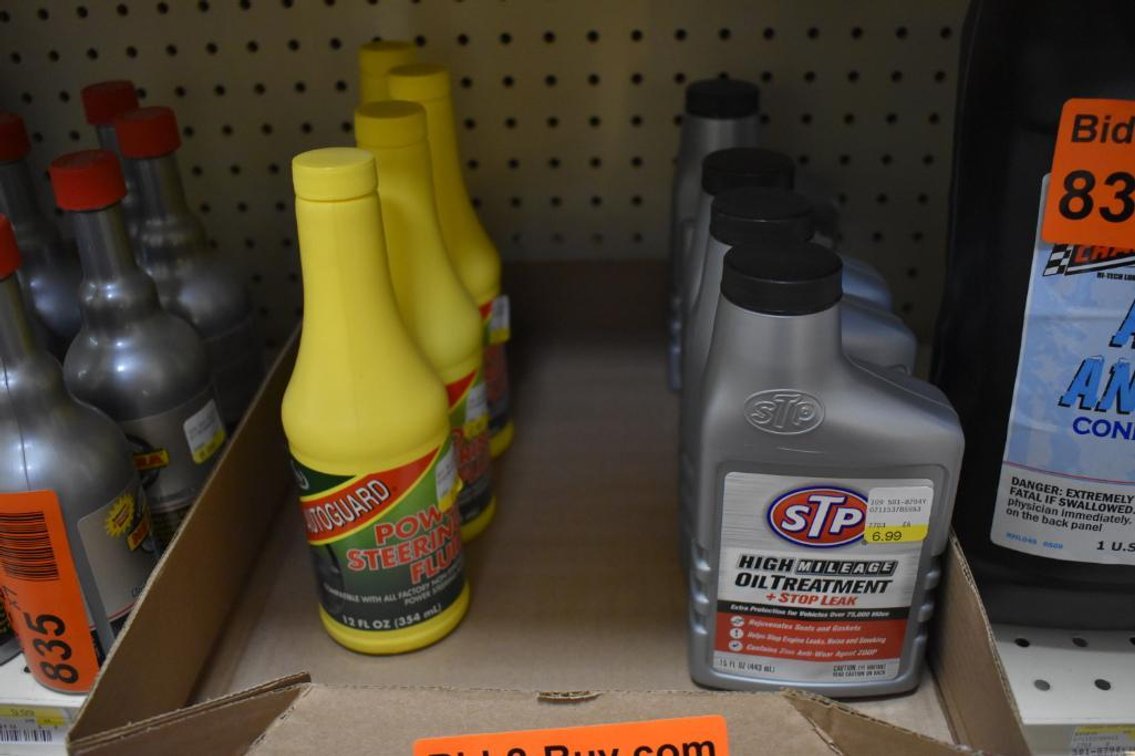 (4) 15 Oz Jugs Of STP High Mileage Oit Treatment And (4) 12oz. Jugs Of Power Steering Fluid