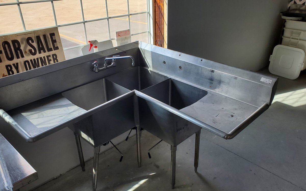 Corner 3 compartment stainless sink, 58.75 inches wide each way with faucet and super drains.