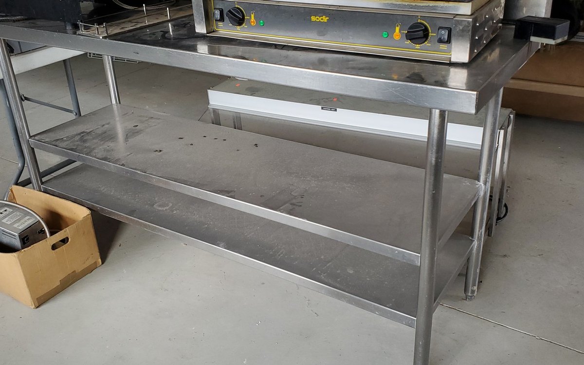 Commercial HD stainless steel table with 2 lower shelves. (very well made and expensive when NEW) 72 x 24"