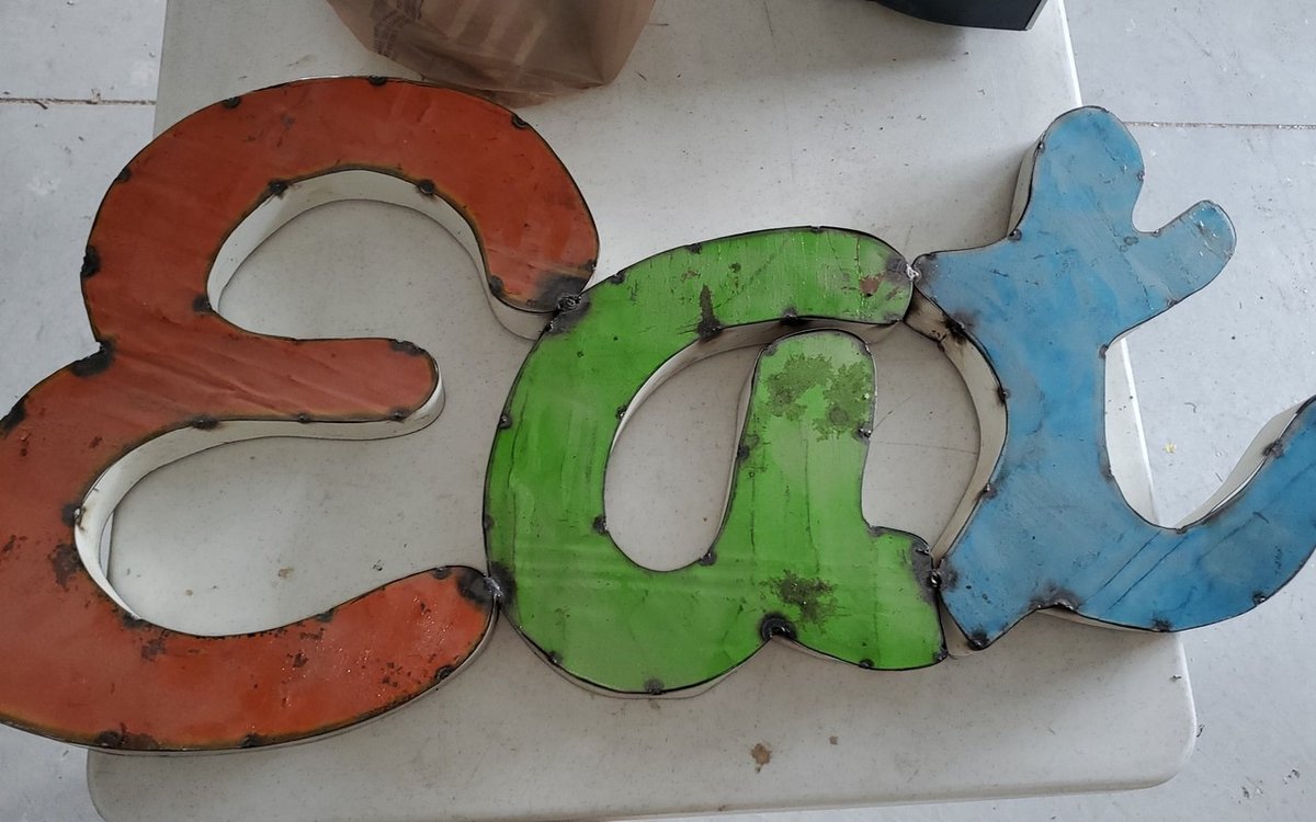 EAT metal sign art