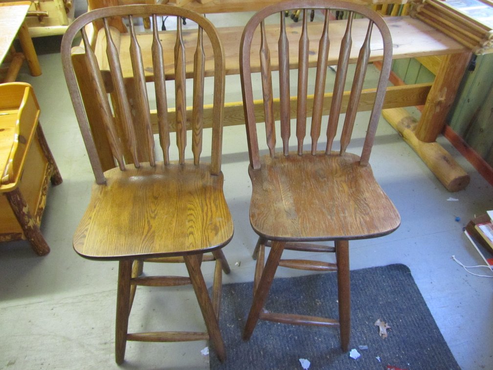 (2) Oak Swivel Chairs