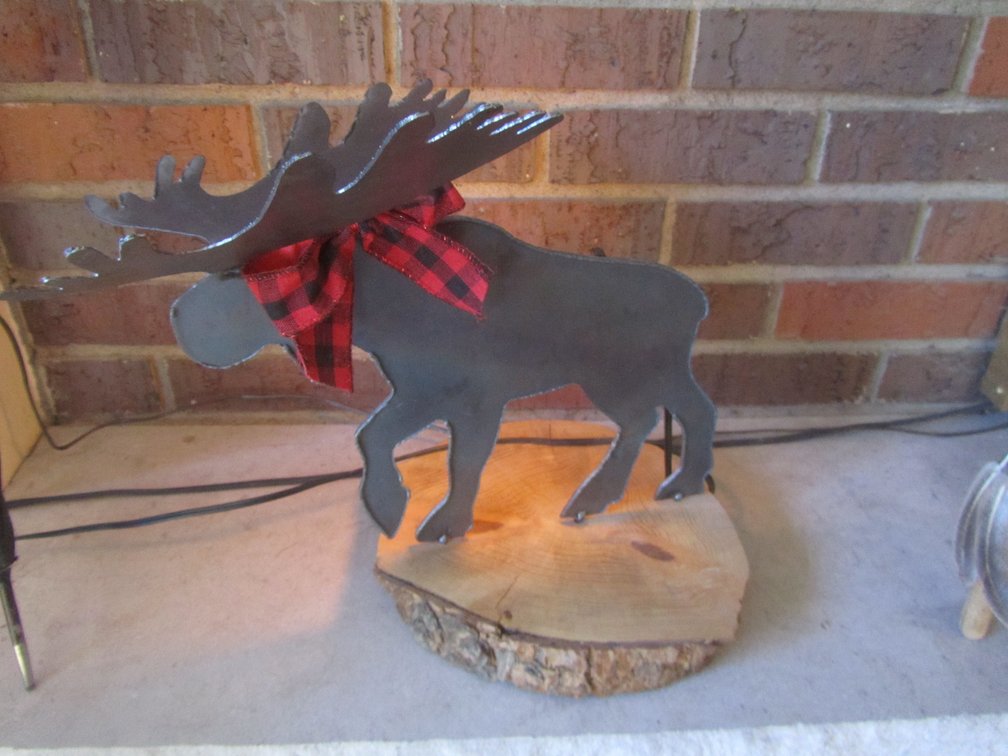 Metal Moose Lamp On Wood Slab